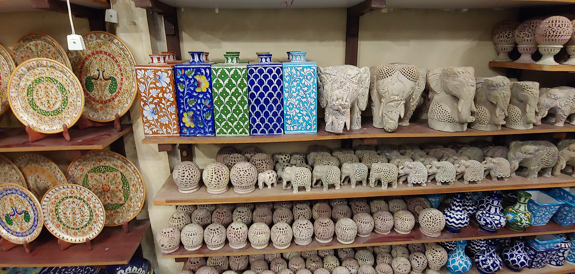 Jaipur Blue Pottery plates and vases with cobalt-blue and turquoise floral glaze