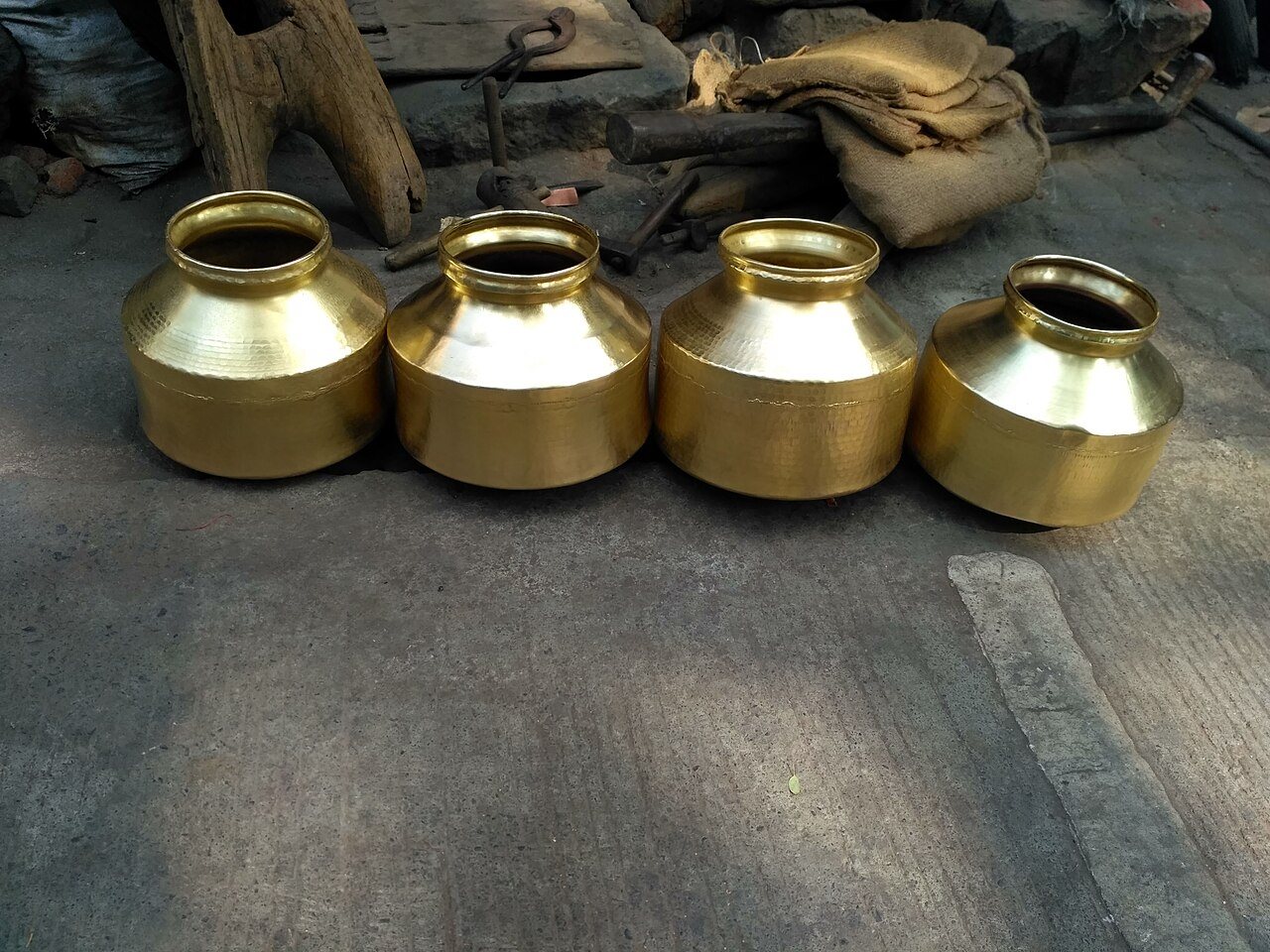 Water pots (handas) at Tambat Aali, the coppersmiths' lane in Pune